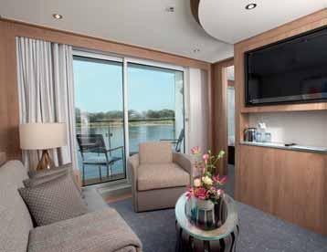 features of a Standard Stateroom plus: Suite size 275 sq. ft.