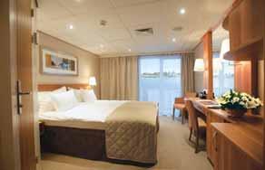 ll find a 26 flat-screen TV with infotainment system featuring movies on demand plus BBC News, CNBC Europe, CNN, Sky Sports 1, National Geographic and more All staterooms and suites also have a