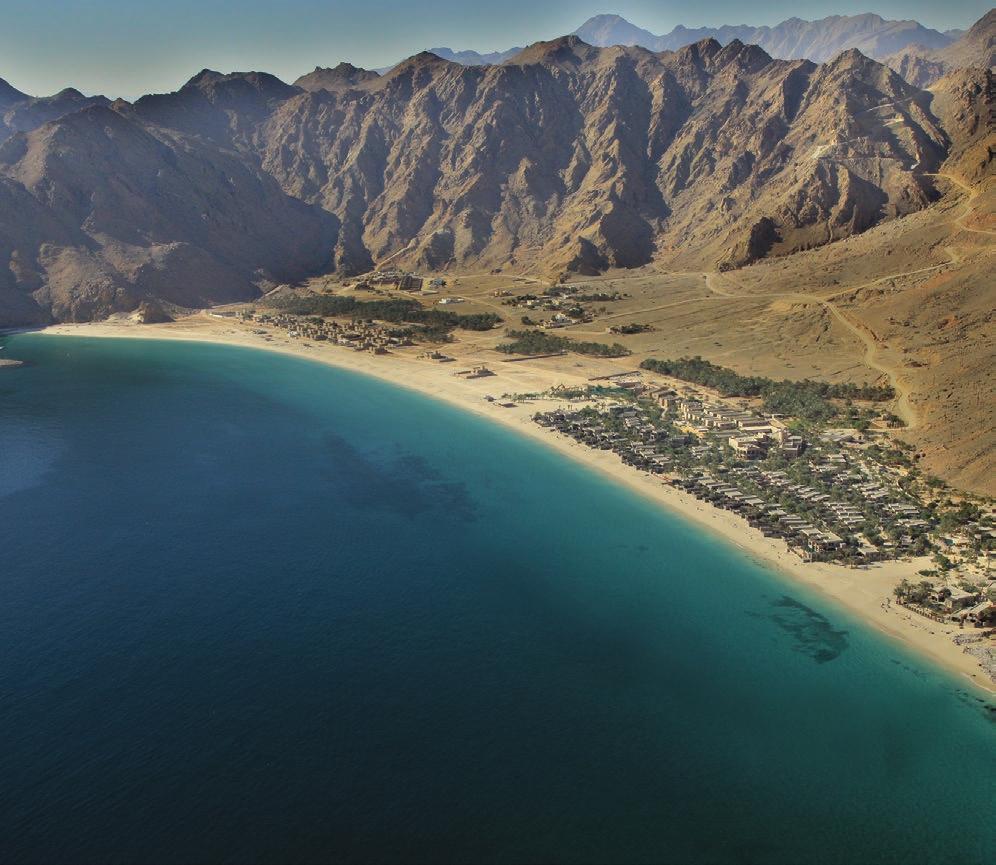 Six Senses Zighy Bay, Oman Set within a secluded inlet flanked by a private sand beach and lunar-like limestone mountains, Six Senses Zighy Bay enhances the arresting coastline of Oman s Musandam