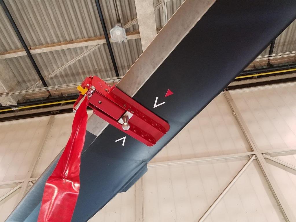 Main Rotor Blade Folding Procedure 1. Using an appropriate maintenance stand located at the forward left side of the helicopter, install the designated Blade Clamp on each of the pre-marked blades.