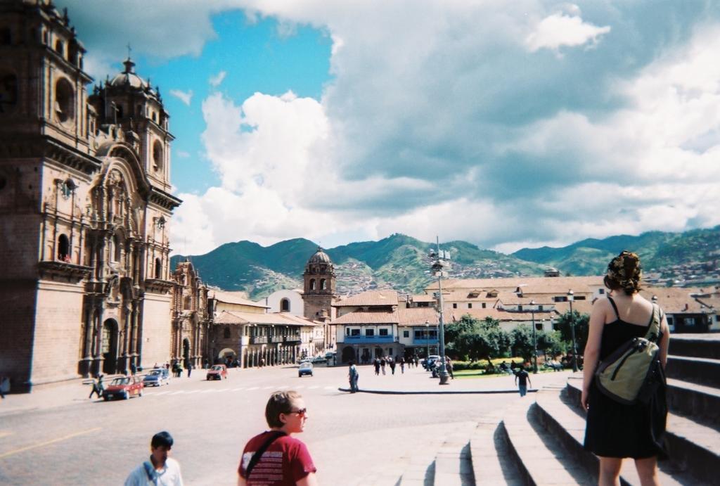 When standing on these stairs of a cathedral in Cusco you can see the main square and the surrounding mountains.