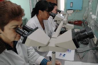 Cuban biotech researchers work in a clinic in Cuba. Many in the Tampa Bay area medical community hope warming relations between the two nations helps the U.S. benefit from Cuban medical successes.