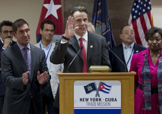 New York Gov. Andrew Cuomo waves as he and his delegation prepare to depart Havana, Cuba, on April 21, 2015.