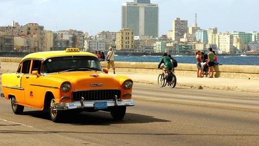 CNBC New York, New York 21 April 2015 Cuba is opening slowly, but it has a long way to go Reem Nasr @reemanasr Robin Thom Getty Images/ A taxi cab in Havana, Cuba.