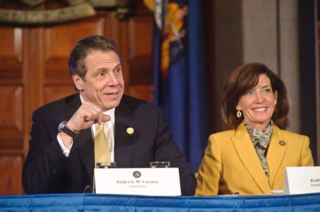 Eric Jenks/for New York Daily News/ Gov. Cuomo s (seen with Lt. Gov. Kathy Hochul) trip to Cuba starting Monday is not political, his spokeswoman says.