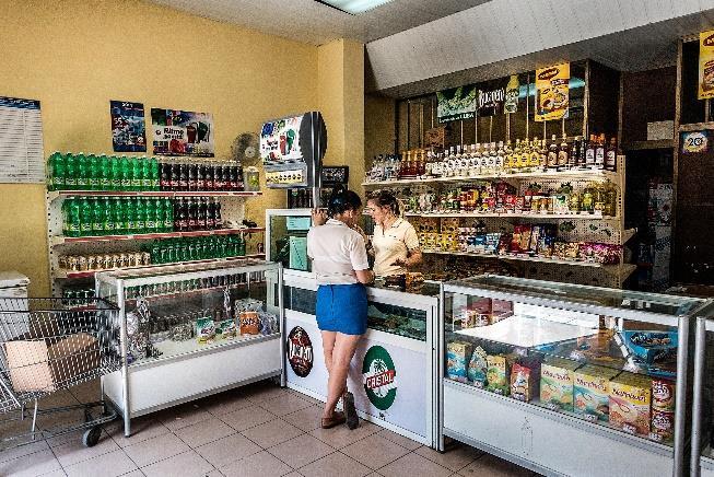 Workers in a CUC shop managed by the government in Sancti Spiritus.