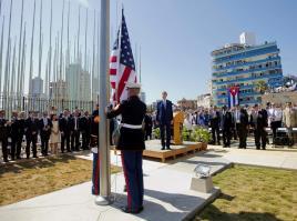 Tampa Tribune Tampa, Florida 9 September 2015 Cuba ovations may require Obama to renew enemy status Secretary of State John Kerry, and other dignitaries watch as U.S. Marines raise the U.S. flag over the newly reopened embassy in Havana, Cuba.