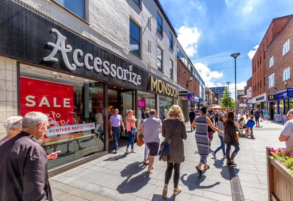 SITUATION The property occupies a very strong trading position fronting the prime section of pedestrianised George Street and immediately adjacent to the Stamford Quarter shopping centre.