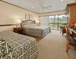 Relax in the guest rooms which feature Hawaiian décor and artwork.