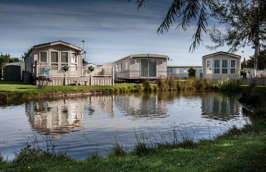 THE PARK The park extends over approximately 5.55 acres of land and is developed with 41 fully serviced holiday static caravan pitches of which 37 are presently occupied by privately owned caravans.
