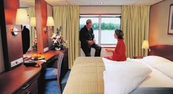 C A B I N C A T E G O R I E S Deluxe Stateroom (A) Standard Stateroom (E) Features Features Stateroom size: 170 sq. ft. Hotel-style beds with optional twin-bed configuration Stateroom size: 120 sq.
