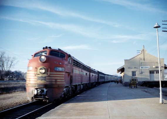 Left - In the heyday of passenger train operations in the 1950s, the Frisco operated 3 daily passenger trains each way through Neosho, milepost 309: trains 1-2, The Texas Special to San