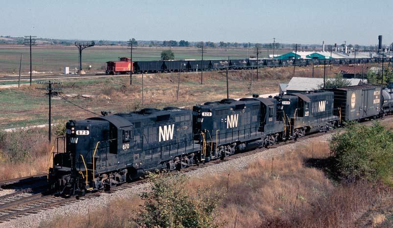 The 3rd track is out of view to the right of the photo. (Joe Collias) Below - Henrietta is at milepost 411 on the Santa Fe, just a few miles north of the Missouri River in Ray County.