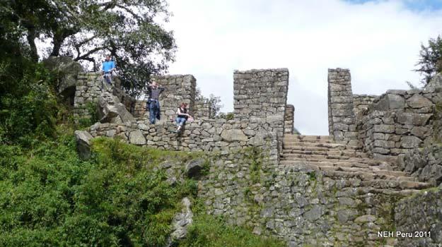Hikers, who follow the Inca Trail, reach Machu Picchu via the Sun Gate "Intipunku" (right), located high above the