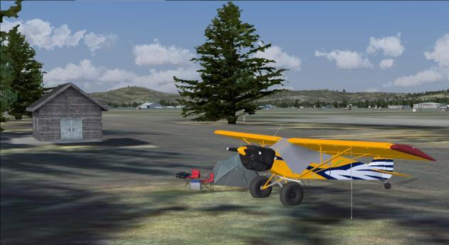 A few of the highlights from landside FSX Scenery Area Google Earth area includes the satellite dishes at the flight service station, the static DC-6 aircraft that are being used for spare parts and