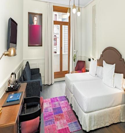 in central Madrid, this 4-star hotel is a five-minute walk from the famous Puerta del Sol Square.