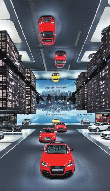 Exhibition stand AUDI at the IAA Frankfurt 2013 Accomplishment: Construction of the hall of a base area of 3,400 square meters and complex interior installation with hanging city landscapes DDC