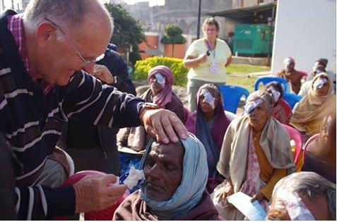 Men s Shed at Kings Meadows PDG Michael Perkins, the new chairman of Rotary Australia World Community Service, shown here in Nepal removing bandages from patients the day after cataract surgery.