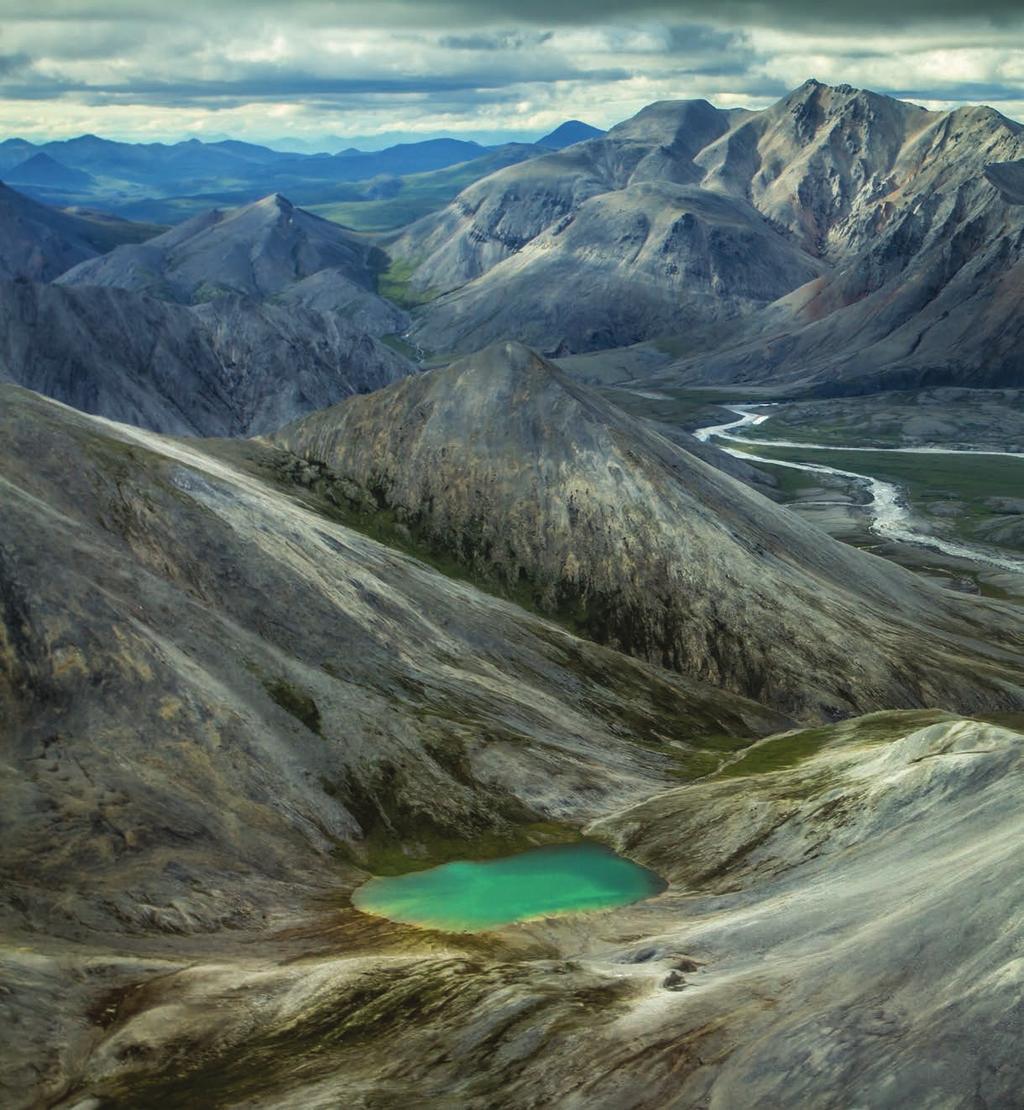 ON LOCATION A small glacial pond or tarn, glitters in the wild Baird Mountains of Alaska s western
