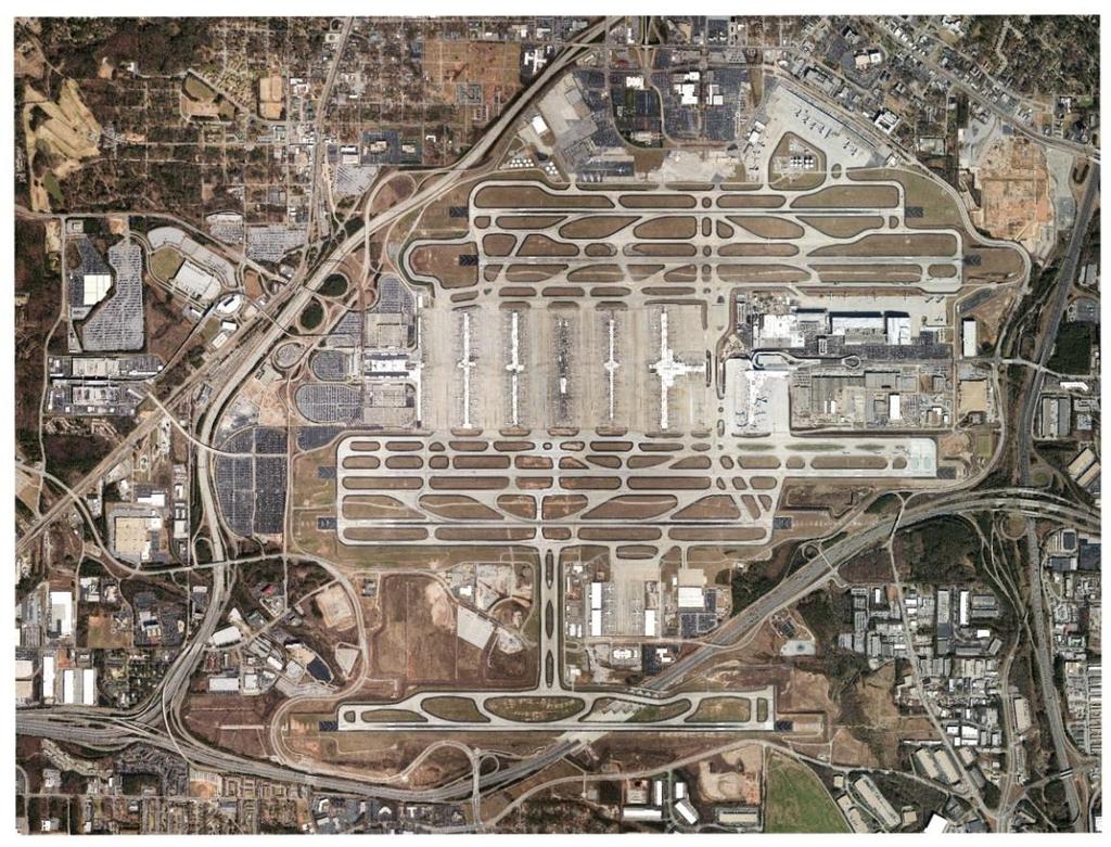 Executive Summary Airport Facilities The design and location of ATL has made it an ideal facility for large volumes of passengers and aircraft operations since the current complex was opened in 1980.