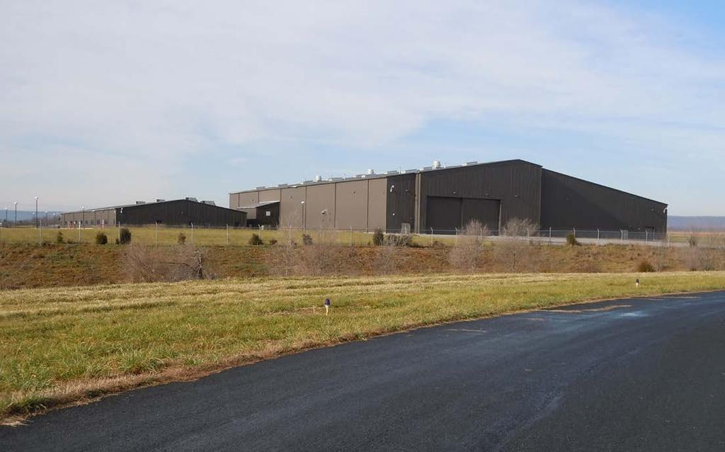 Ft. - 25,000 CEILING HEIGHT Manufacturing/Warehouse/Hanger Area - 30 at eaves and 47-10 at center (under steel beams) Office Space - 8 MARTINSBURG, WEST VIRGINIA Dates of Expansion - None Date