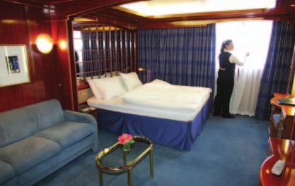 All suites include a bedroom with beds that can be configured as two twin-size beds or one queen-size bed, sitting area, ample closet space, mini-refrigerator, satellite TV/DVD, marble-appointed