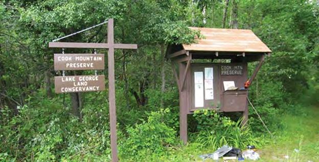Chapter Three: Hiking Trails The Cook Mountain Preserve was established in 1990 through two private dona ons of 192 acres to the Lake George Land Conservancy.