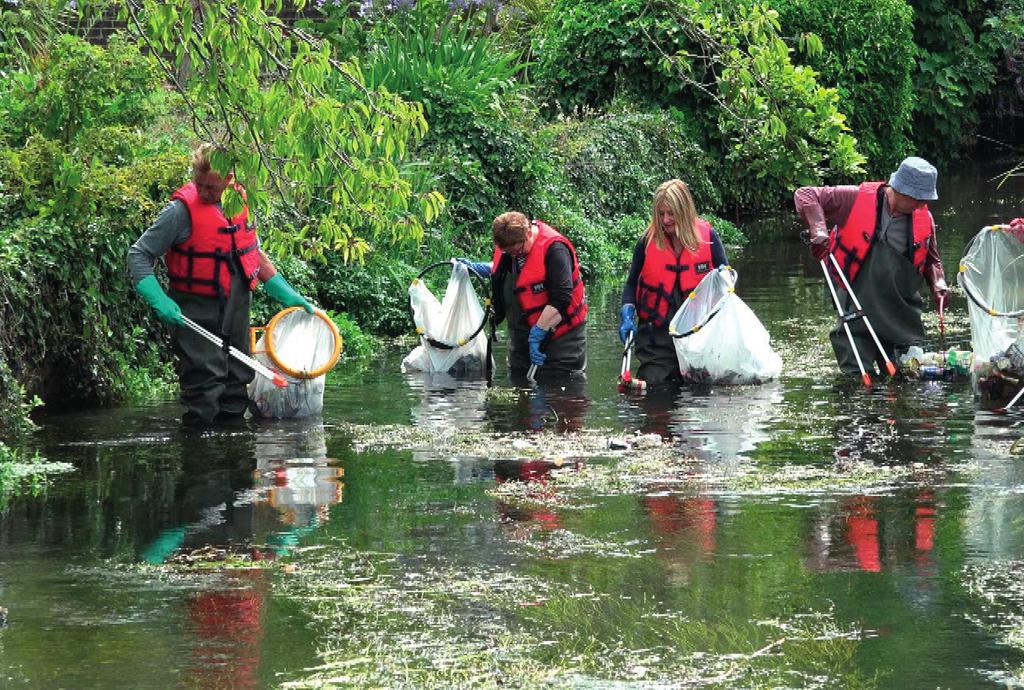 Volunteering Volunteers from the White Cliffs Countryside Partnership (WCCP) help to remove the rubbish found in the River Dour.
