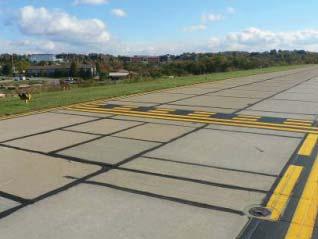 magnified. Taxiway E at KPIT provides a good example of this problem, as depicted through the diagram and photos below.