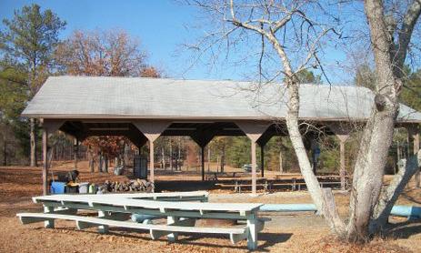 CAMP MU-SHA-NI FACILITIES (CONTINUED) Large Picnic Shelter The Large Picnic Shelter is located just as you enter the Encampment Field area and close to the camp s pond.