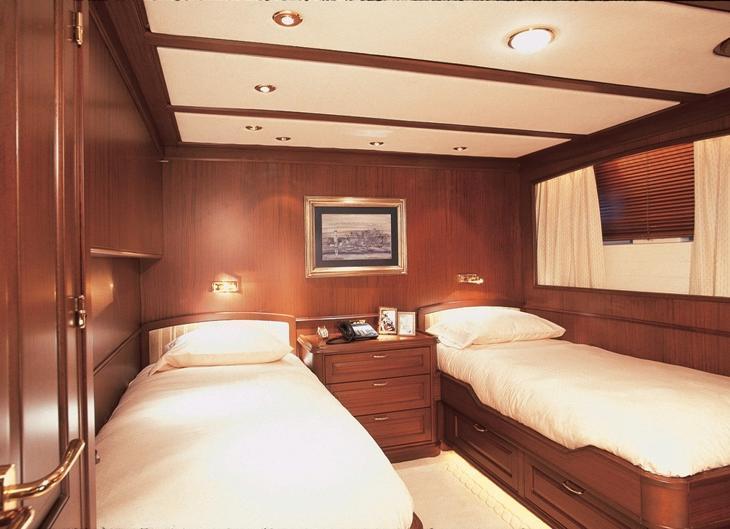 Motor yacht can accommodate 6 guests in 3 staterooms. (Murphy beds atop the twin beds in one stateroom allows an additional two small children passengers, for a total of 8 guests.
