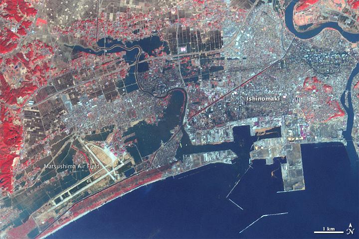 acquired March 14, 2011 Water is dark blue in this false-color image. Plant-covered land is red, exposed earth is tan, and the city is silver.