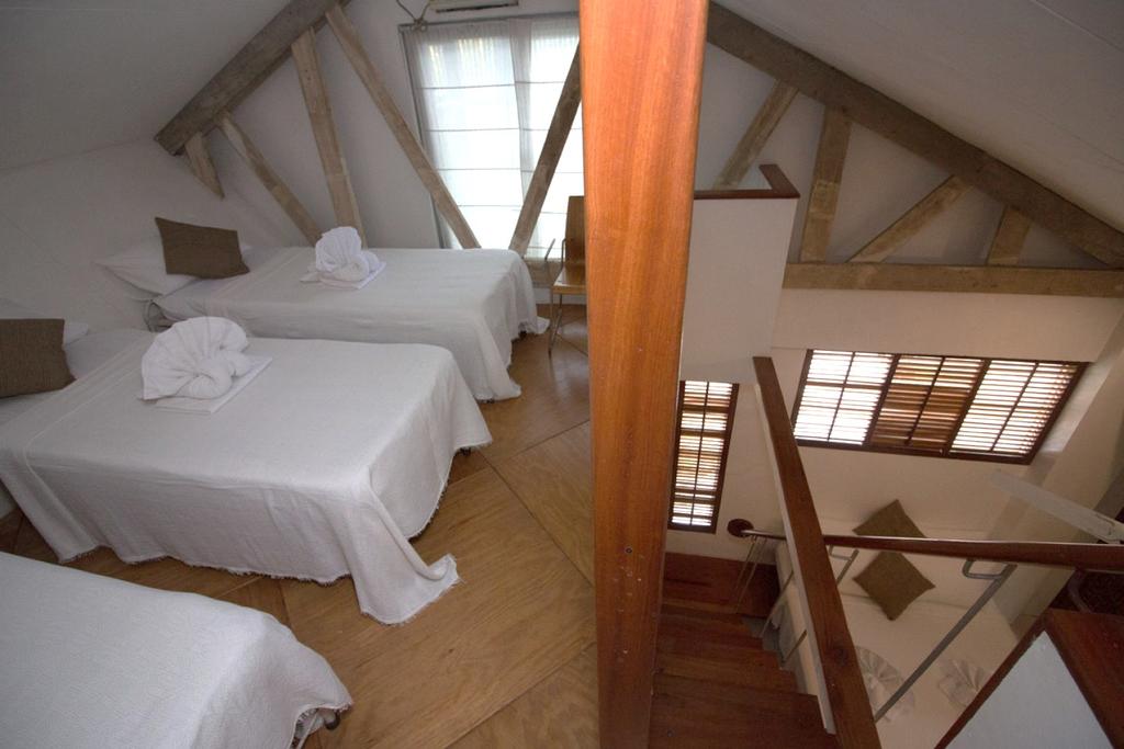 Deluxe Room with Attic and Veranda Good for 4 to 5 persons Room size is 14.