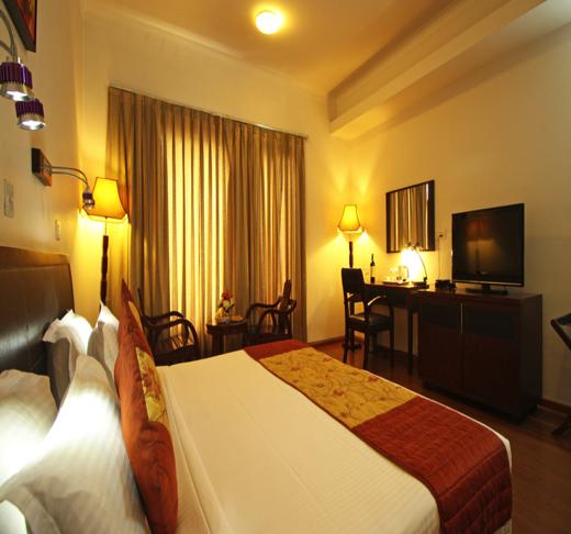 Mint Sarojville Spacious Rooms with wooden floorings Rooms available in both Single and Twin Bed formats High quality bed-sheets and towels Intercom for Room