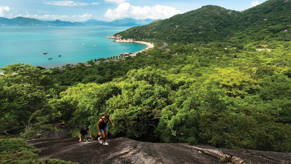 8 GUIDED ADVENTURE HIKE Channel your inner sense of adventure and hike a trail that leads to a mountaintop from where you overlook the entire panorama of Ninh Van Bay.