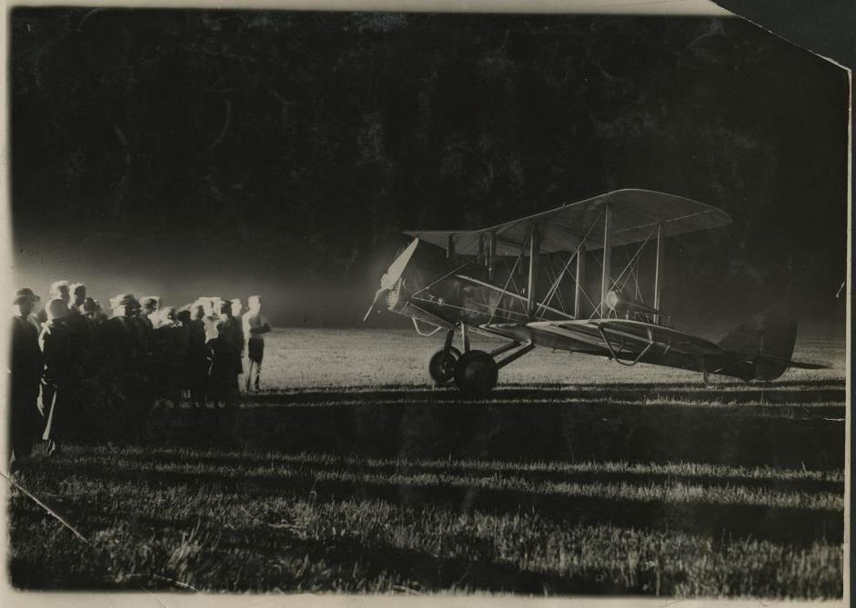 DH-4 mail plane equipped with lights on nose and wingtips, for night flying, around