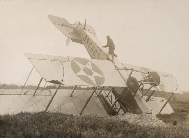 Lieutenant Torrey Webb and his mechanic were thrown from the plane but not injured when their plane tipped over when landing near Boston on June 6, 1918.