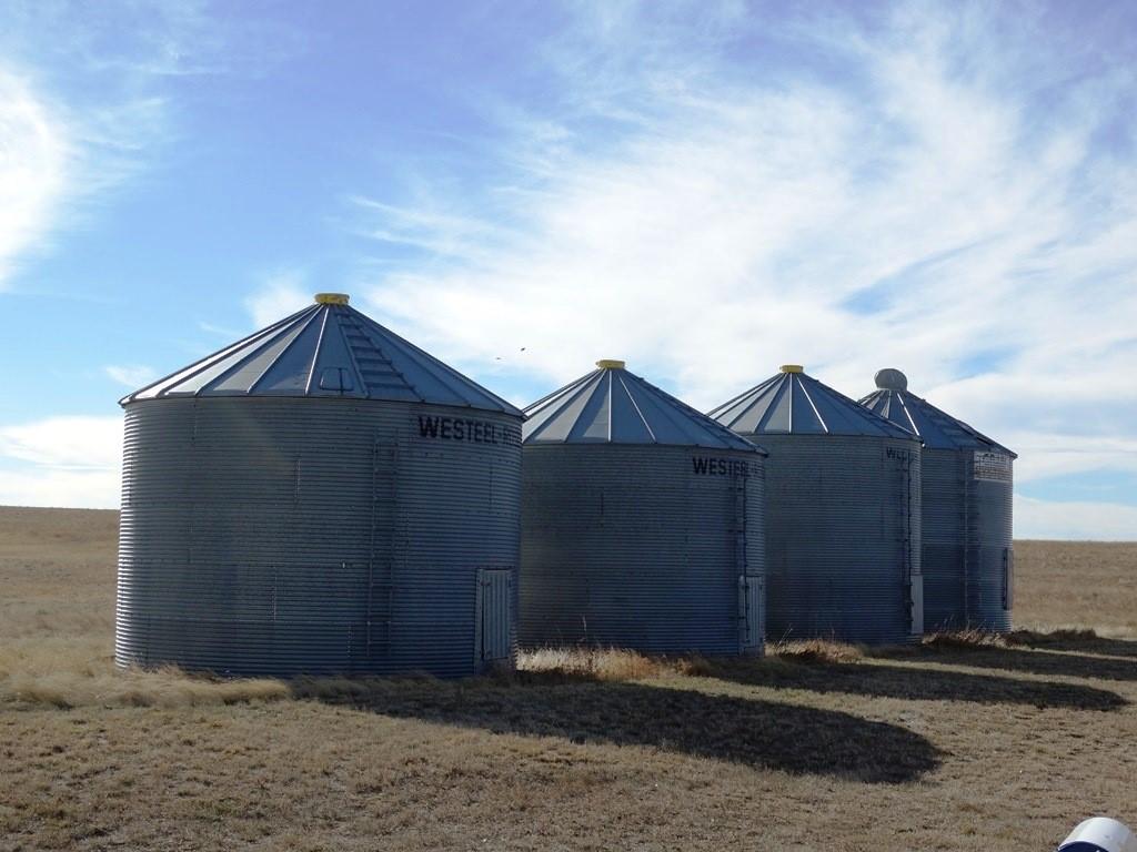 Numerous other outbuildings and grain storage.