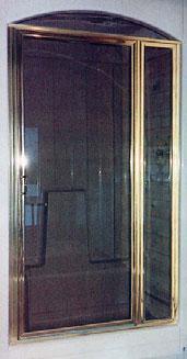 The Polished Brass door and in-line panel display the finest traditional