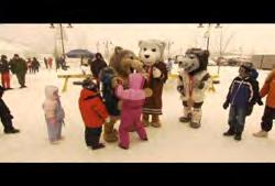661 YT-HD-003 Yukon Territories: Whitehorse: Cabane a Sucre (Sugar Shack): Wide shot of the three territory mascots dancing with