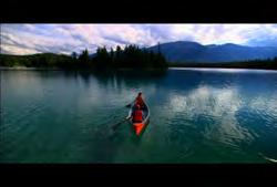 AB-HD-022 Alberta: Jasper: Fairmont Jasper Park Lodge: Young couple canoeing on