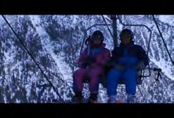 00:00:04:18 N Clip #: 303 AB-HD-010 Alberta: Banff: Slow pan on older couple riding chairlift
