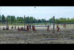00:00:09:21 N Clip #: 388 ON-HD-009 Ontario: Toronto: Wide shot of two beach volleyball