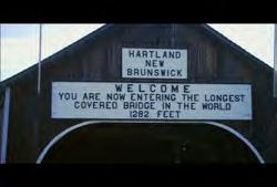 Hartland: Hartland Covered Bridge: Wide shot of truck waiting to drive through Hartland