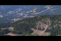 rafting in river 01:08:56:17 N 01:09:06:14 N 00:00:09:27 N Clip #: 051 BC-HD-001 British Columbia: Squamish: Aerial of parasailer gliding