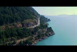 Clip #: 054 BC-HD-001 British Columbia: Coast Mountains: Aerial around Black Tusk with hikers on top of mountain 01:09:49:19 N