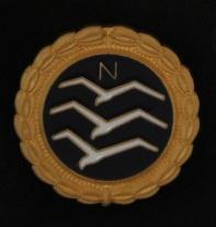 The Gold Badge: The N stands for the USA. Gulls represent the three tasks of the Badge. For each task: You will need an Official Observer and a barograph or flight recorder.