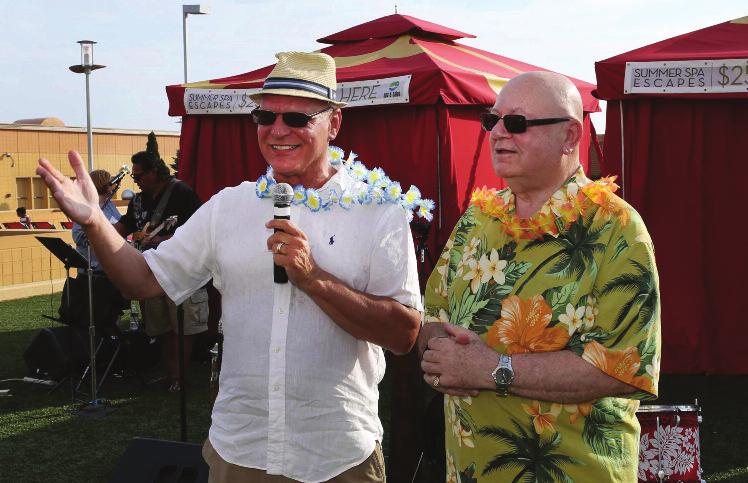 Over 700 people attended the famous Auction and Summer Mixer dressed in Hawaiian attire to help support the Scholarship Foundation.