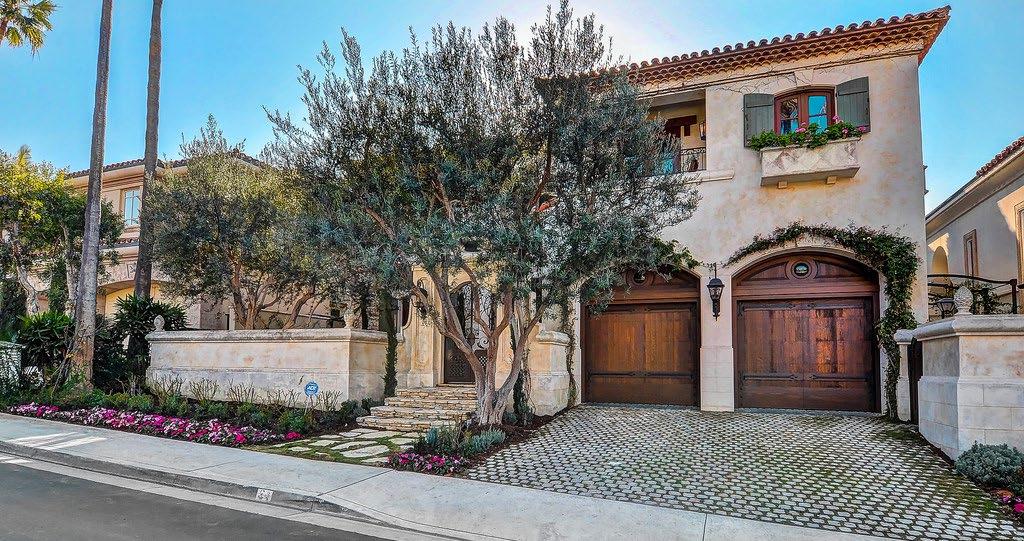Walk to the sea from the most exquisite, magnificent custom home imaginable...like living in the south of France overlooking one of the world s most beautiful beaches.