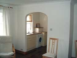 Well equipped Kitchen off the Lounge, with built under cooker,